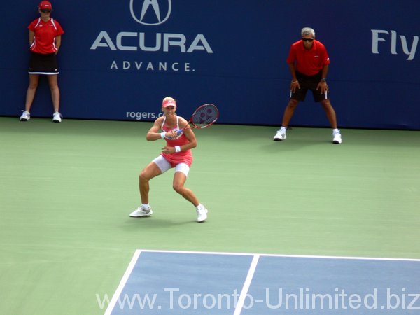 Elena Demetieva returning serve.