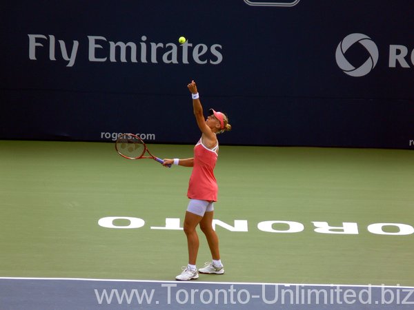 Elena Dementieva serving.