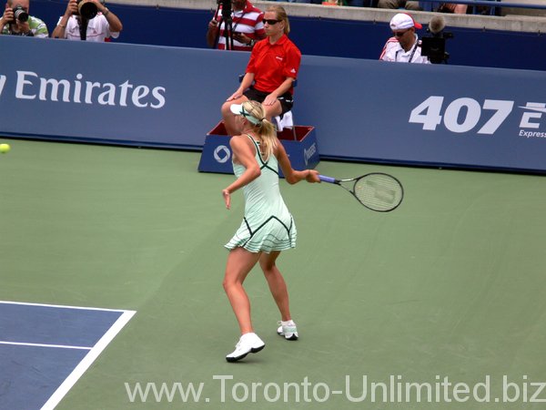 Maria Sharapova preparing to return the ball.