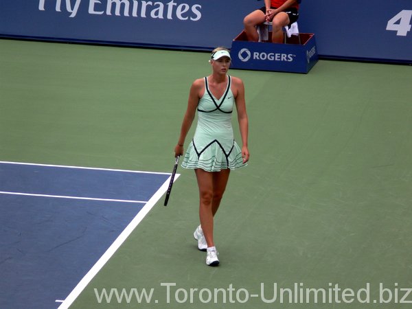 Maria Sharapova walking on Centre Court.