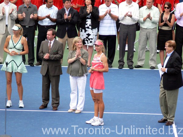 Dementieva and Sharapova on Centre Court, making speeches.