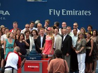 Dementieva in the middle of Tennis Canada Directors and Staff posing for photos.