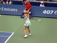 Maria Sharapova preparing to return the ball.