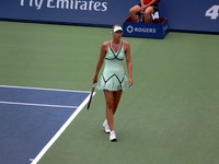 Maria Sharapova walking on Centre Court.