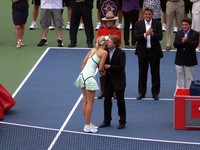 Sharapova, finalist receiving cheque.