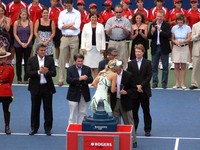 Sharapova finalist receiving her trophy.