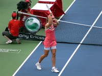 Dementieva waling on Centre Court with her Trophy!