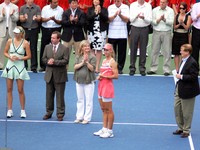 Dementieva and Sharapova on Centre Court, making speeches.