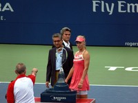 Tennis canada photographer pointing to Elena Dementieva, Nadir Mohamed and Karl Hales.