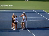 Spaniards shaking hands with Australian team.