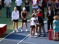 Doubles Champions are being congratulated.