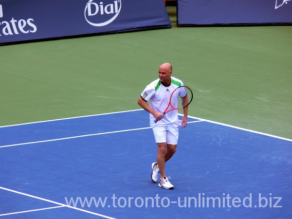 Andre Agassi on Centre Court during exhibition game.