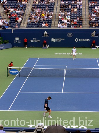 Jim Courier and Andre Agassi on the Court.