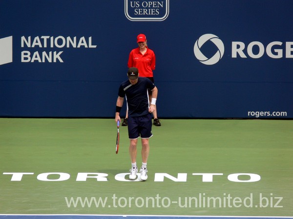 Jim Courier preparing to serve