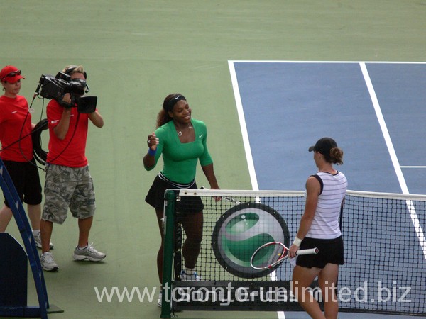 Serena Williams Champion shakes hands with Samantha Stosur