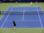 Jim Courier and Andre Agassi on Centre Court of Rexall Centre.