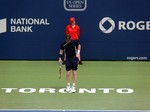 Jim Courier preparing to serve