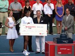 Serena Williams and her winner's cheque