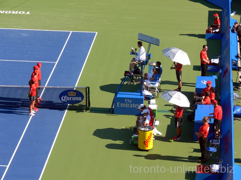 Granollers, Lopez and Mike, Bob Bryan are sitting during changeover, doubles final, August 12, 2012 Rogers Cup in Toronto. 