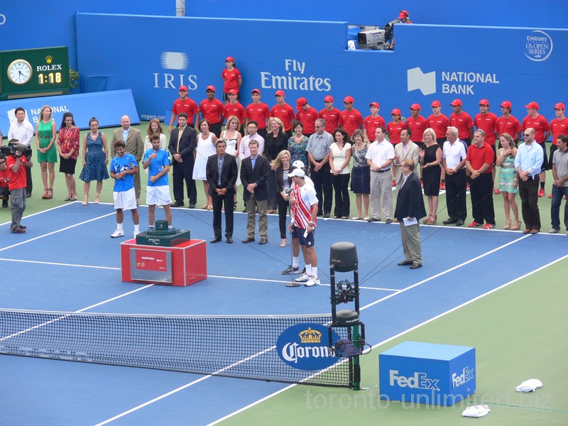 Doubles Championship closing ceremony with champs and runners up on Centre Court and Tennis Canada staff. August 12, 2012 Rogers Cup in Toronto.