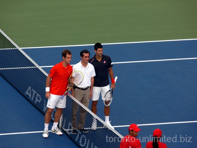 Richard Gasquet, Umpire and Novak Djokovic posing for photo on Centre Court before the final match. August 12, 2012 Rogers Cup.
