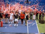 Closing ceremony with confeti and fireworks on Centre Court and Champion Novak Djokovic with his Trophy. August 12, 2012 Rogers Cup.