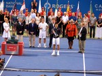 Novak Djokovic is standing with his Championship Trophy. August 12, 2012 Rogers Cup.