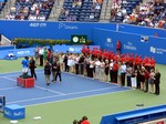 Doubles Championship closing ceremony. Marcell Granollers and Marc lopez are presented with runnersup trophy form Karl Hale, Tournament Director. August 19, 2012 Rogers Cup.
