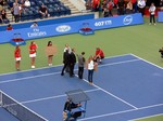 On the court ceremony to honour 2012 Wimbledon Juniors Champions Filip Peliwo and Eugene Bouchard. August 12, 2012 Rogers Cup.     