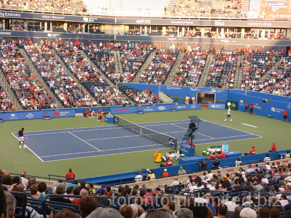 Central Court with beatifull sunset while Novak Djokovic and Bernard Tomic are playing, August 8, 2012 Rogers Cup.