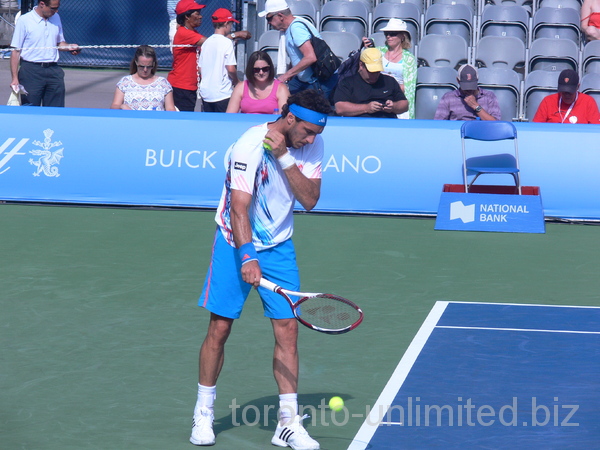 Juan Monaco of Argentina on Grandstand Court with Vasek Pospisil, Canada, August 7, 2012 Rogers Cup.