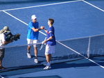 Matthew Ebden has just won and is shaking hands with Peter Polansky on Centre Court August 6, 2012 Rogers Cup.