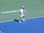 Mikhail Kukushkin of Kazachstan on Centre Court with Frank Dancevic August 7, 2012 Rogers Cup.