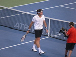 Winner Raonic walking on the court toward the camera and interview, August 7, 2012 Rogers Cup.