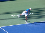 Peter Polansky with serving motion, August 6, 2012 Rogers Cup.