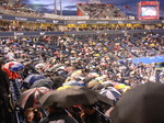 Spectators with their umbrellas on Central Court, April 11, 2012 Rogers Cup.