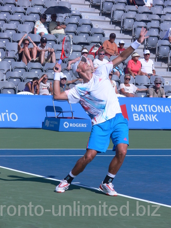 Vasek Pospisil Canada playing Juan Monaco of Argentina on Grandstand Court, August 7, 2012 Rogers Cup.