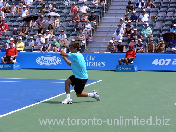 Filip Peliwo of Canada on Grandstand Court in qualifying match Rogers Cup 2012.