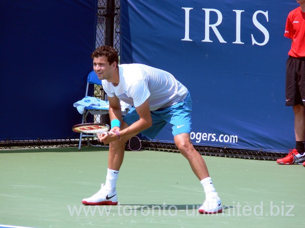 Grigor Dimitrov of Bulgaria in qualifying match, receiving serve. 