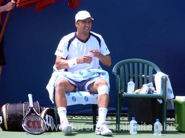 Marco Chiudinelli on tennis court. 