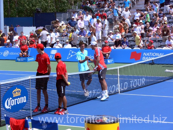 Filip Peliwo is shaking hands with the winner.