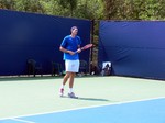 John Isner of USA practicing on Court 2 during Rogers Cup 2012.