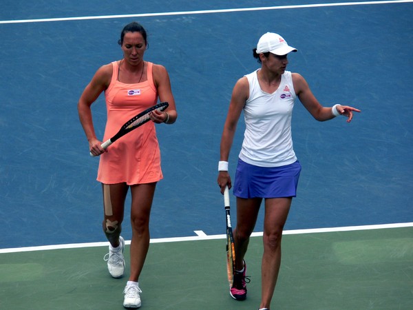 Jelena Jankovic (SRB) and Katarina Srebotnik (SLO) on Centre Court during Doubles Final August 11, 2013 Rogers Cup Toronto