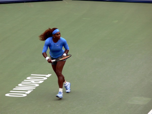 Serena Williams running on Centre Court playing final with Sorana Cirstea August 11, 2013 Rogers Cup Toronto