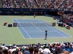 Serena Williams and Sorana Cirstea playing the Championship match on Centre Court August 11, 2013 Toronto