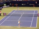 Petra Kvitova (CZE) and Eugenie Bouchard (CDN) playing on Centre Court August 7, 2013 Rogers Cup Toronto