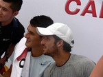 Feliciano Lopez (ESP) and Bernard Tomic (AUS) signing autographs at Rexall Centre August 8, 2013 Rogers Cup Toronto