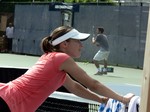 Martina Hingis is stretching on practice court August 8, 2013 Rogers Cup Toronto