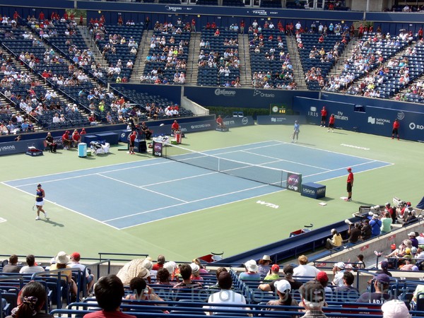 Kirsten Flipkens (BEL) and Serena Williams on Central Court August 8, 2013 Rogers Cup Toronto