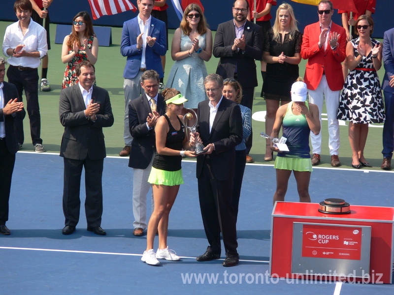 Rogers Cup 2015 Championship Trophy presented to Belinda Bencic by Allan Horn, Chairman of the Board for Rogers Cup Communication 16 August 2015 Toronto.